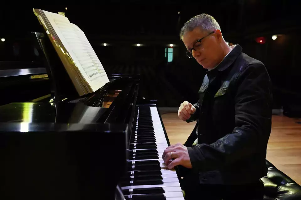 Jose Daniel Flores-Caraballo, conductor and artistic director of Albany Pro Musica, performs on the piano at Troy Savings Bank Music Hall